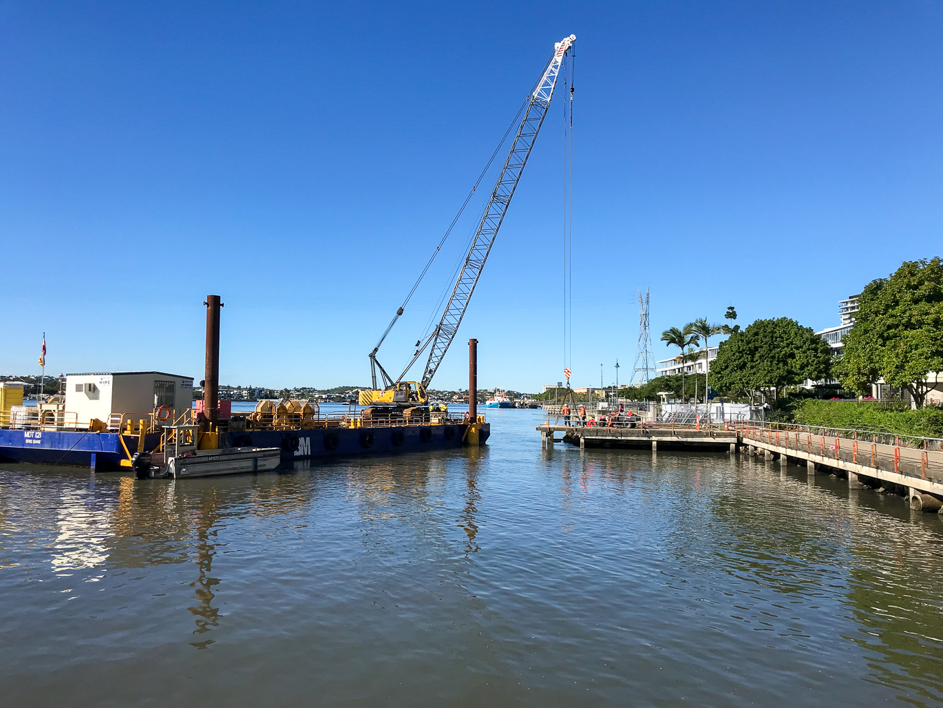 Working in and around water on the Mariners Reach Riverwalk Remediation