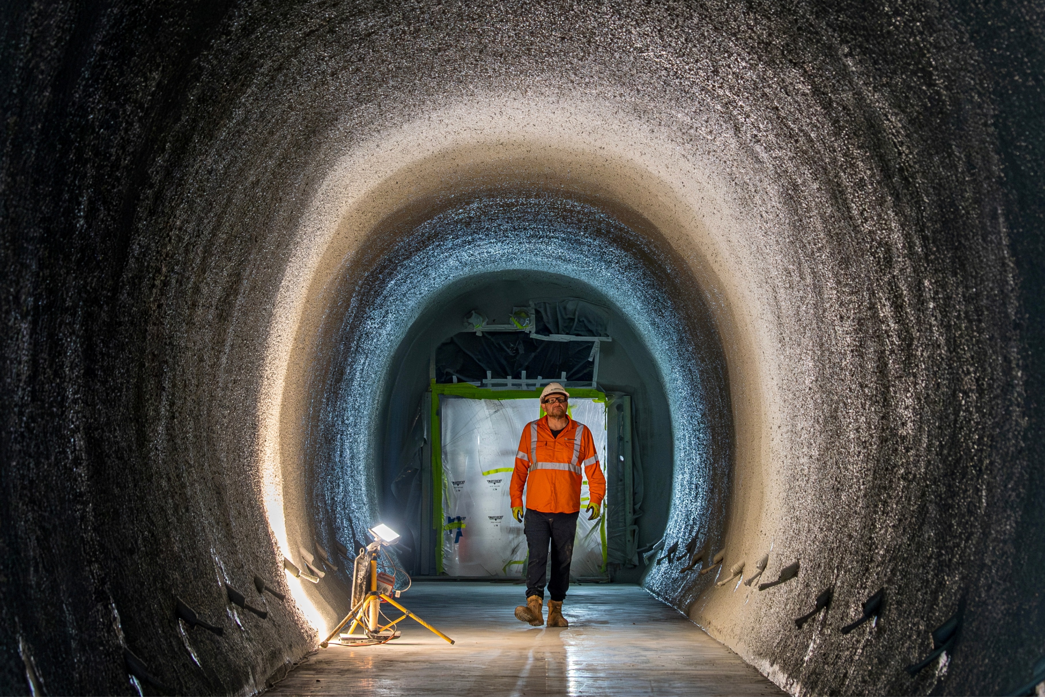 Person in Sandstone Pedestrian Tunnel